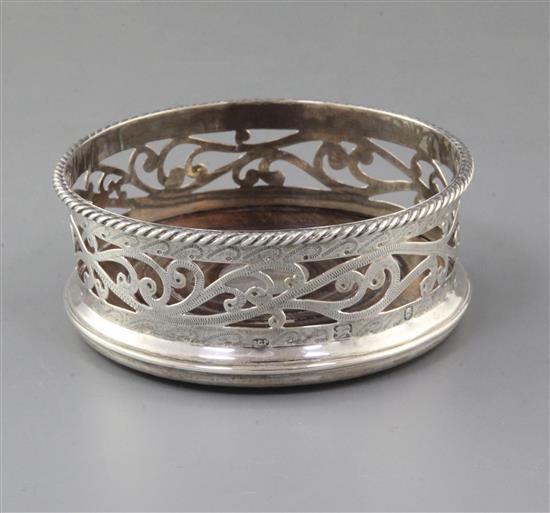 A modern George III style pierced silver wine coaster by Rodney C. Pettit, 13.2cm.